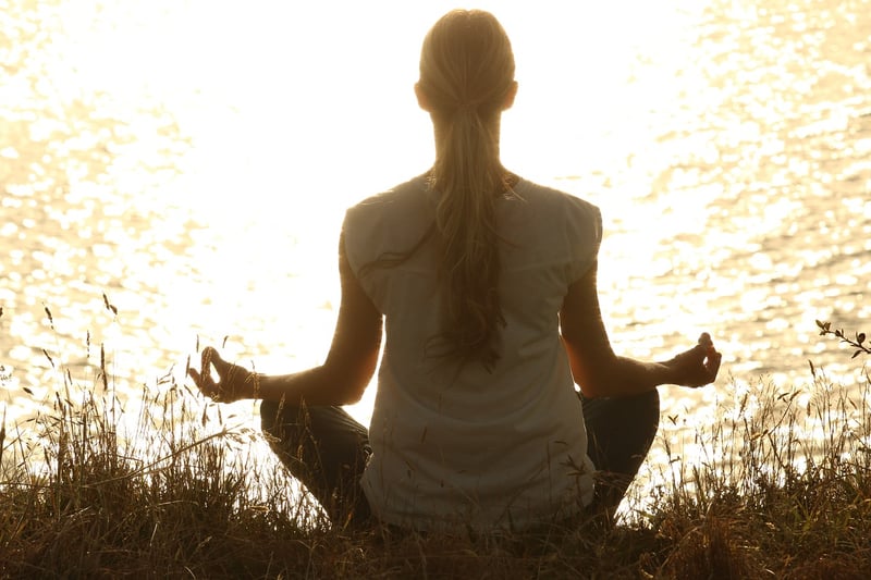 Yoga meditation at sunset